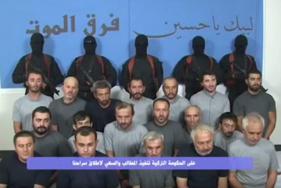 مجموعة شيعية تتبنى اختطاف 18 عاملاً تركياً ببغداد